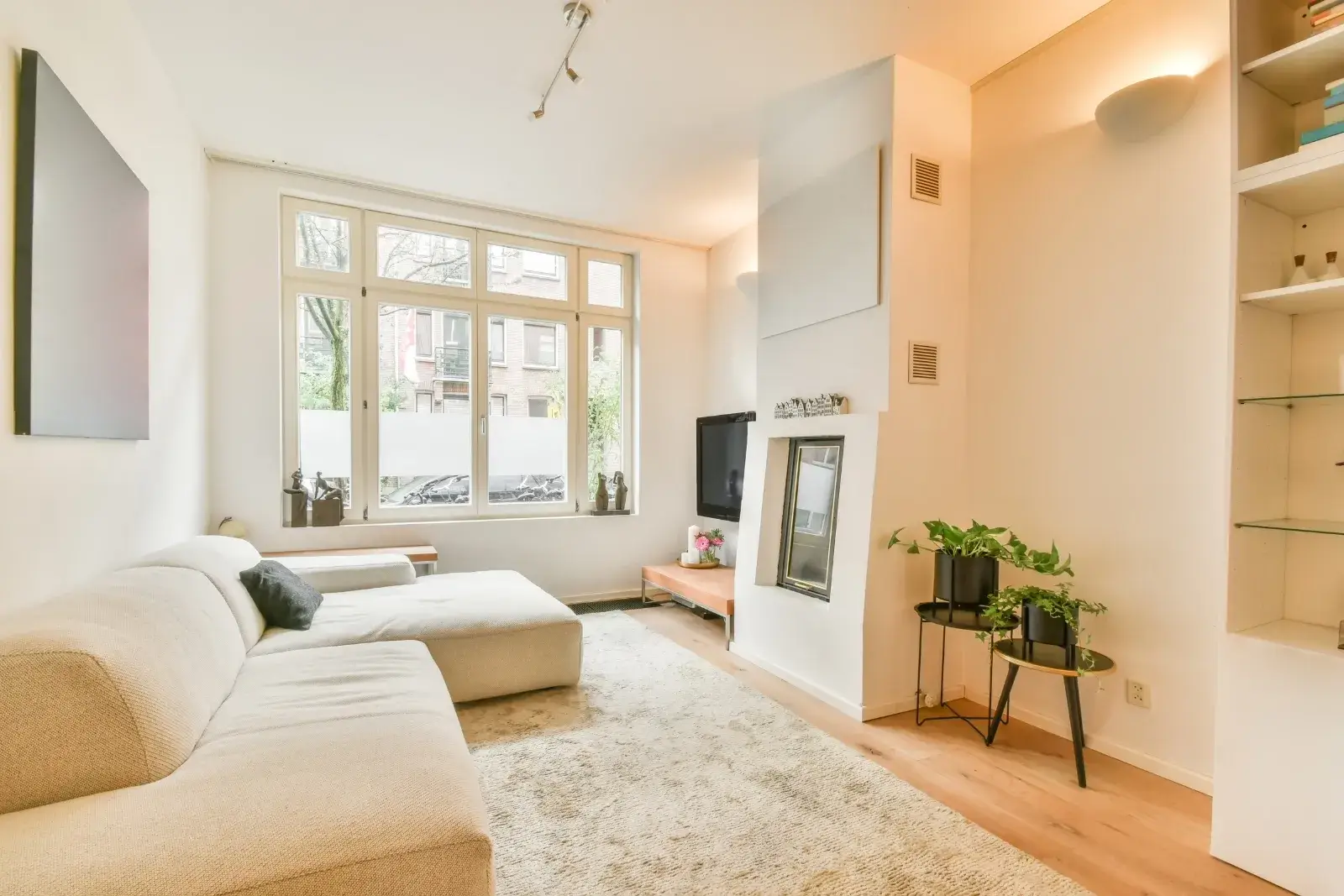 Bright, organized living room showcasing a clean, calm, and welcoming home environment